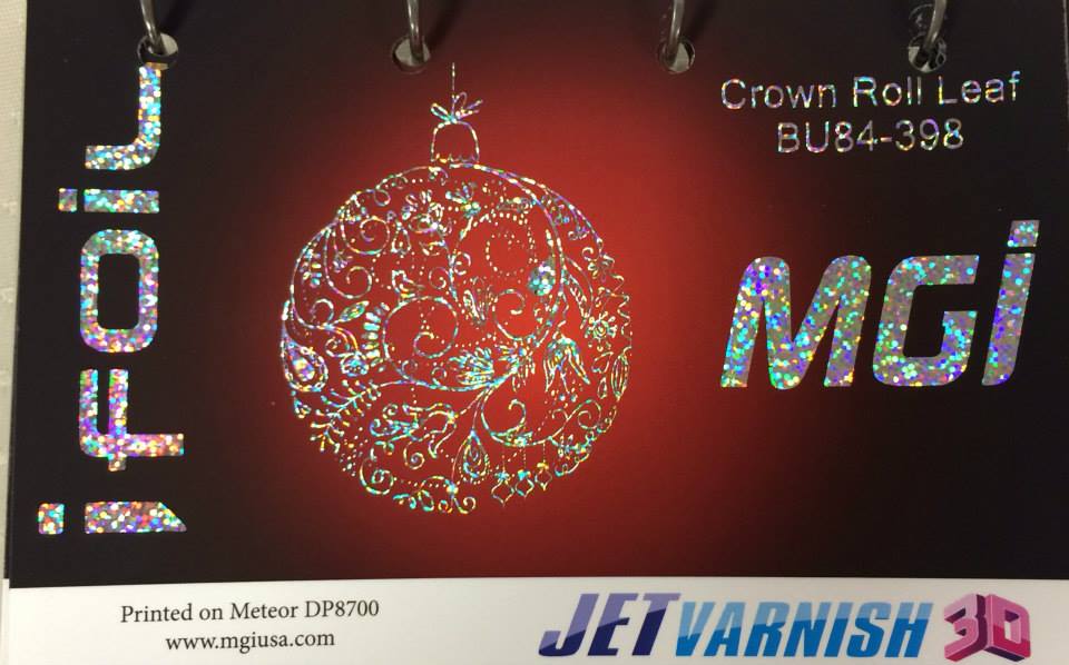 MGI print sample featuring holographic iFoil ornament design on red gradient background with Crown Roll Leaf foil