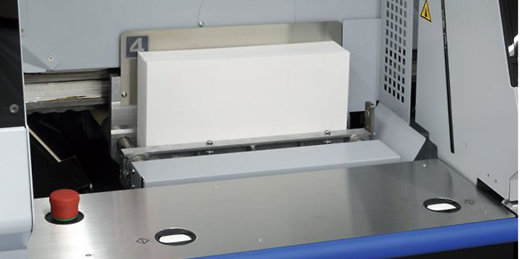 A book block in a binder pocket.